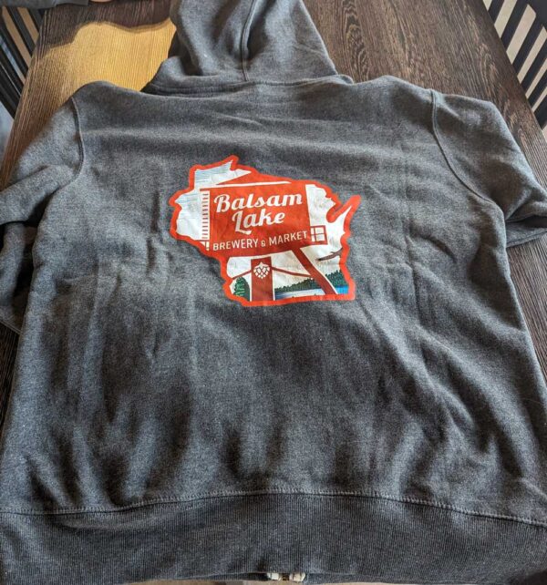 Grey Full Zip Sweatshirt with "balsam lake brewery & market" graphic on the back.
