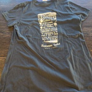 Charcoal V-neck top featuring a graphic design listing seltzer names in the shape of a pint glass, with "Balsam Lake Brewery & Market" written underneath.